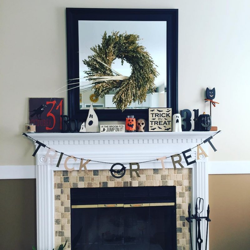 Relevant Elements Used to Decorate Mantel for Halloween.