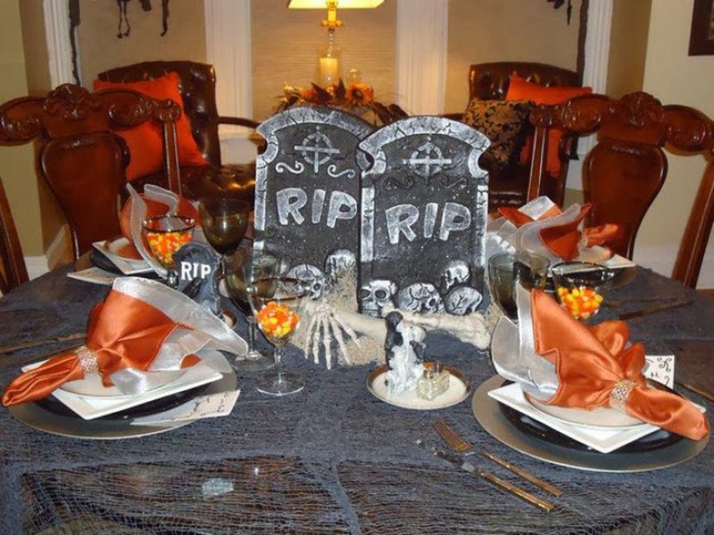 Scary graveyard centerpiece for Halloween table.