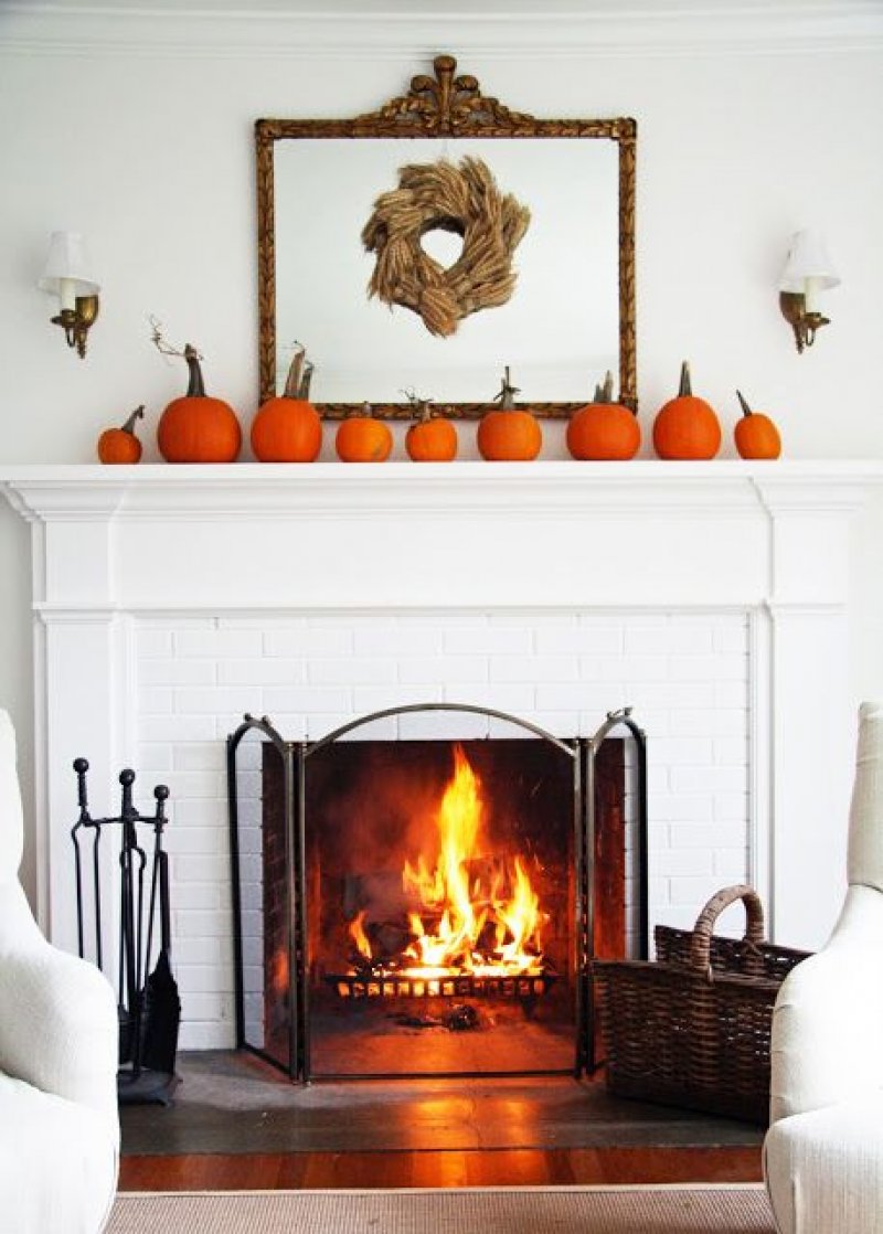 The orange from the fire goes so well with these pumpkins.