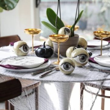 Wicked and eclectic Halloween table setting.