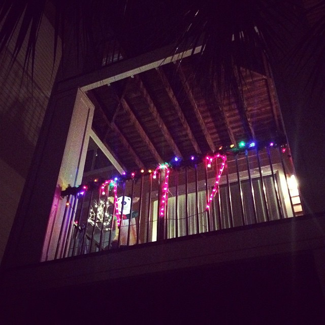 A reindeer, candy canes, garland, and a snow tree.