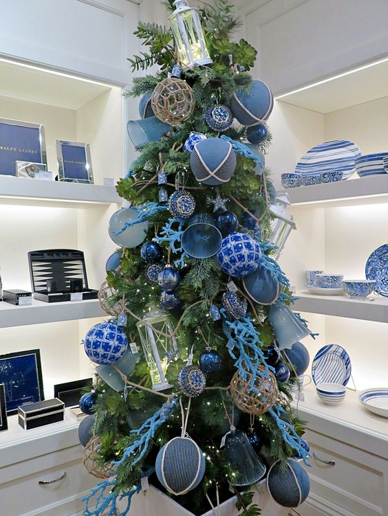 Beautiful Christmas Tree with Blue Ornaments.