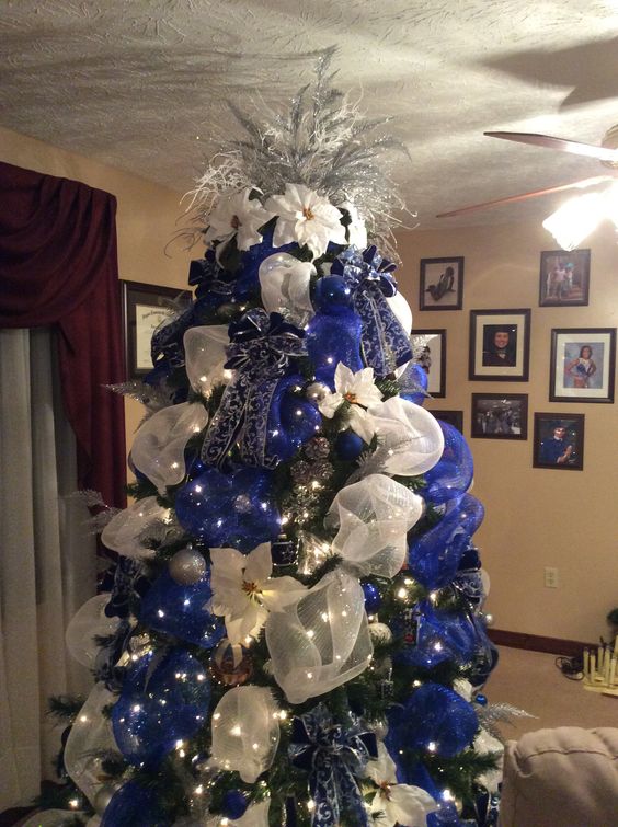 Blue, white, and silver deco mesh Christmas tree.