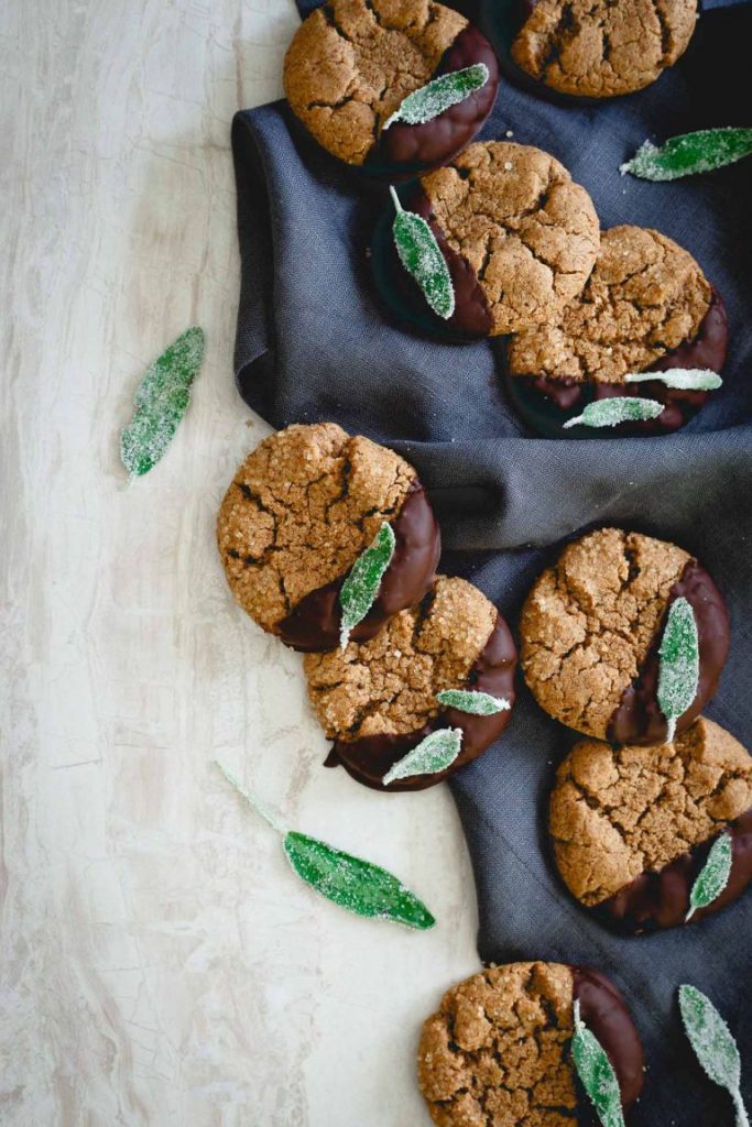 Chocolate Dipped Cashew Almond Butter Cookies With Candied Sage.
