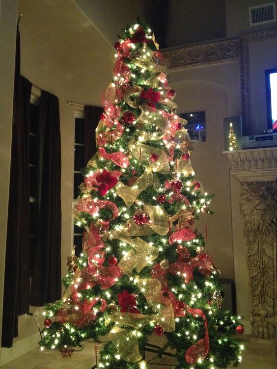 Christmas Tree, featuring deco mesh ribbon, in red and gold.