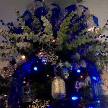 Christmas tree top. Top of the slim line blue and sliver Christmas tree.