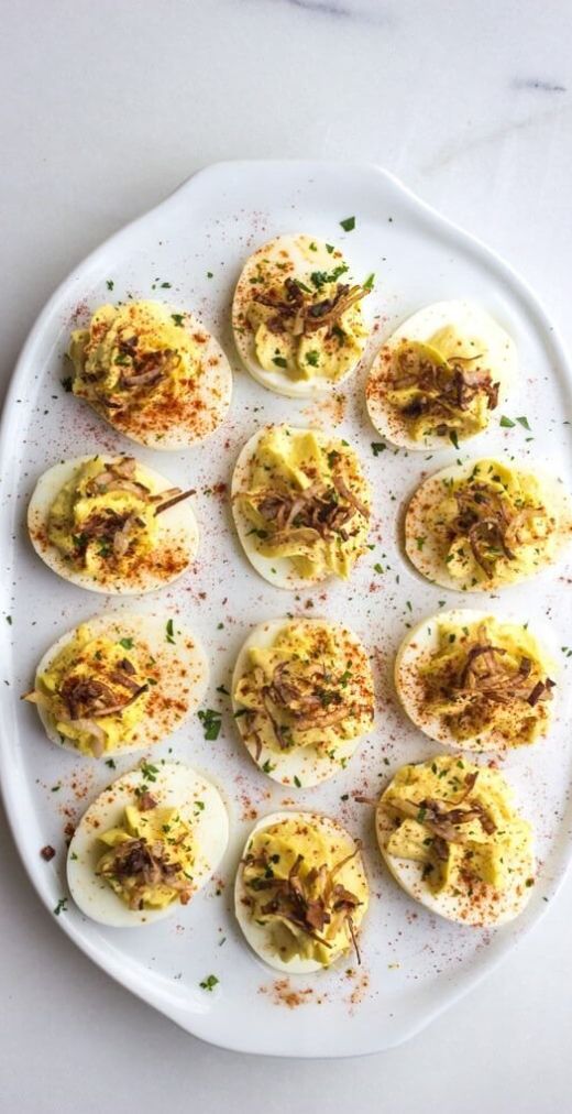 Crab Deviled Eggs with Crispy Shallots