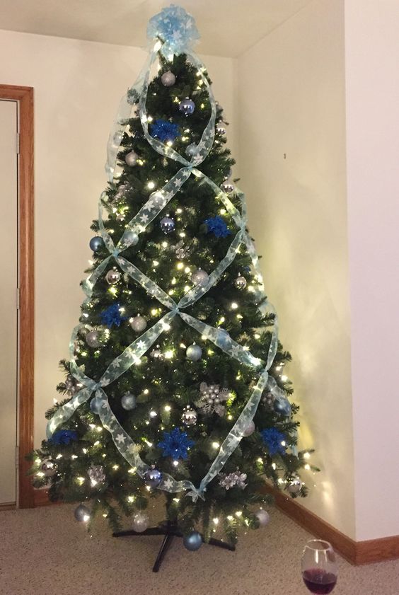 Criss-cross ribbon, blue and silver tree.