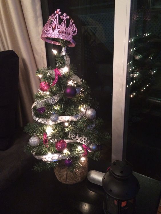 His & hers Christmas trees, her shoe princess Christmas tree.