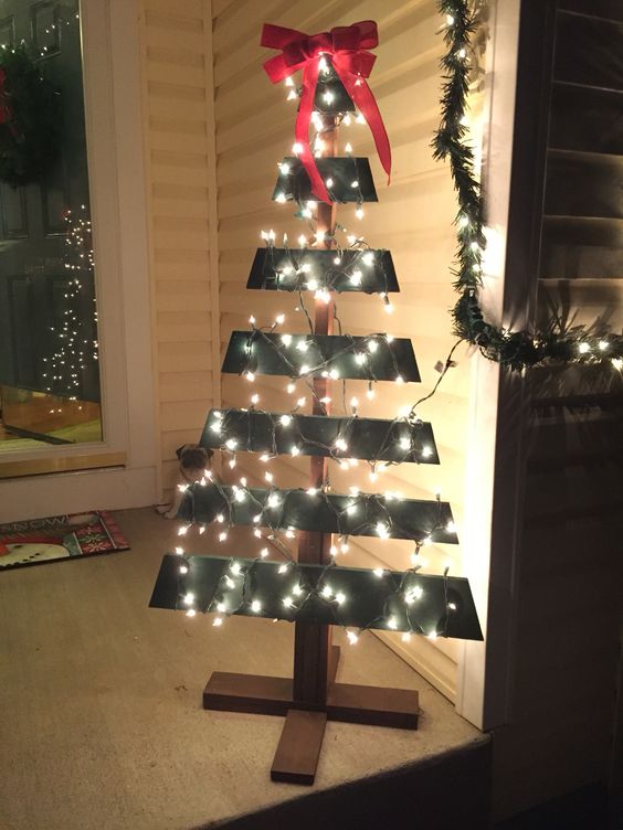 Pallet Christmas tree with string lights.