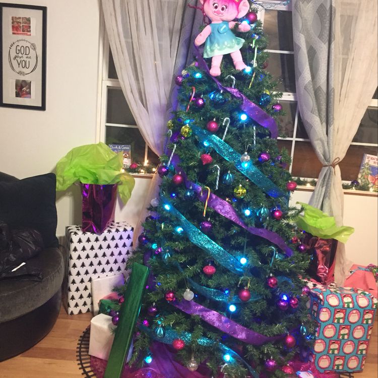 Princess Poppy topping Christmas tree.