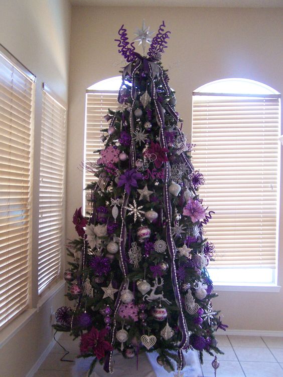 Silver and Purple tree in the daylight.
