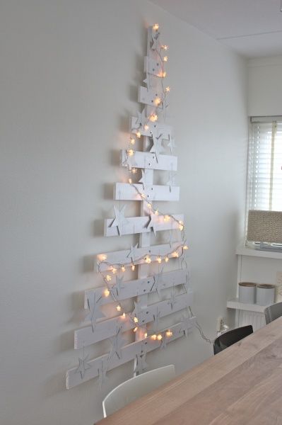 Transform recycled pallets into beautiful Christmas tree.