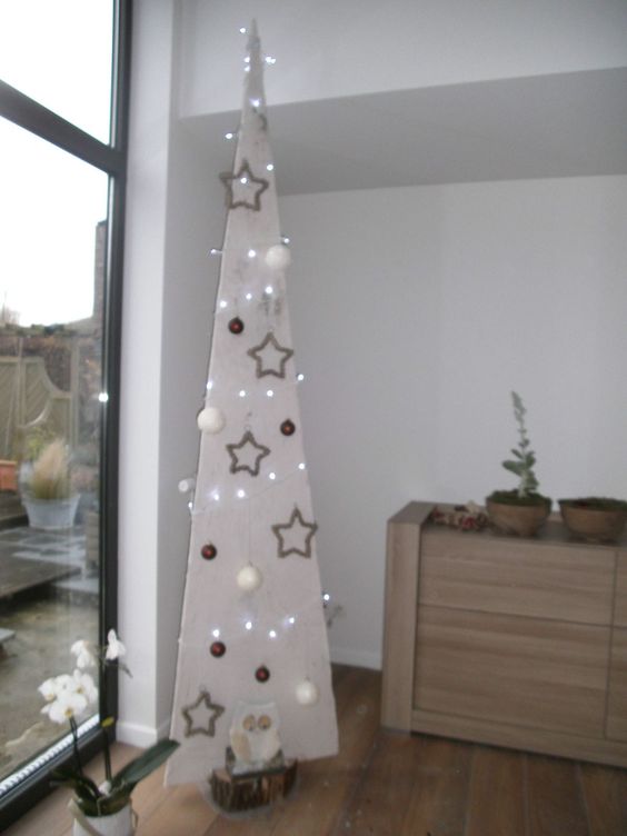 Using reclaimed wood to build alternative Christmas trees.