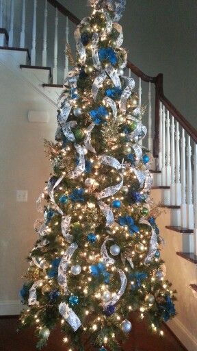 White, blue, silver and gold Christmas Tree.