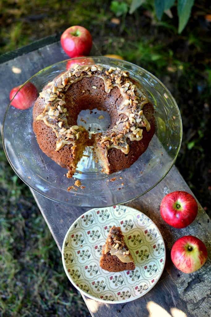 APPLESAUCE OATMEAL BUNDT CAKE WITH CARAMEL DRIZZLE AND BRAZIL NUTS BY SPICE IN THE CITY