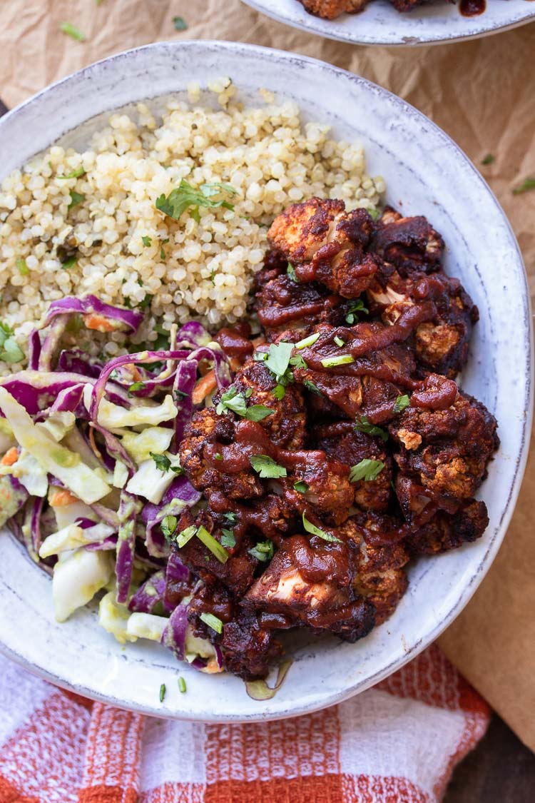 BBQ CAULIFLOWER BITES BOWL WITH TANGY AVOCADO SLAW BY VEGGIES DON’T BITE.