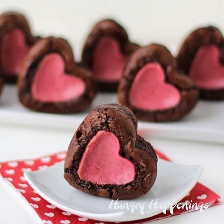Raspberry Cheesecake Stuffed Brownie Hearts.