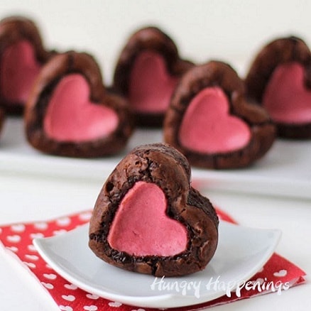 Raspberry Cheesecake Stuffed Brownie Hearts.