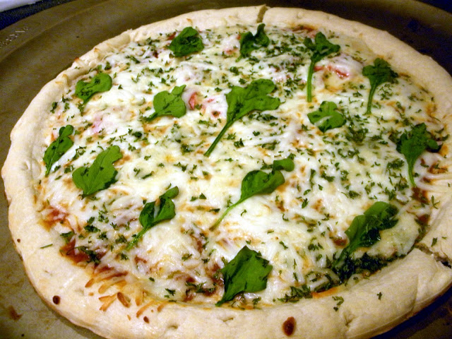 St. Patty’s Day White Pizza with Basil Leaf Shamrocks.